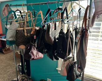 Gorgeous Designer Handbags, Clutch Purses, and More! "Galore!" in excellent condition featuring names like: Louis Vuitton, Coach, Michael Kors, and Many, Many More!!! 