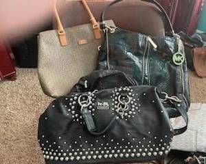 Gorgeous Designer Handbags, Clutch Purses, and More! "Galore!" in excellent condition featuring names like: Louis Vuitton, Coach, Michael Kors, and Many, Many More!!! 