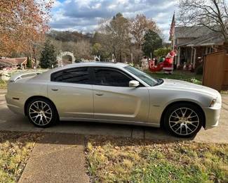 Gorgeous 2012 R/T MAX: Like new both inside and outside * Hemi V8 Motor * Garage Kept ( even the Cup holders on this car are heated and cooled ) Every option that was available is on this car! Owner no longer able to drive it, so it must be sold! Mileage is approx. 145K give or take. Offers on the car will start at  $13,500 . Bids will be taken until 1pm Friday Dec. 15th . At which time the car will be sold to highest bidder for cash or cashiers check.                                         VIN # 2C3CDXCTOCH304482. 