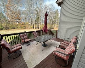 Beautiful Patio Set featuring 6 Chairs, Table, Umbrella Stand, and Umbrella