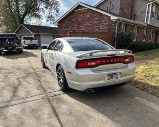 Gorgeous 2012 R/T MAX: Like new both inside and outside * Hemi V8 Motor * Garage Kept ( even the Cup holders on this car are heated and cooled ) Every option that was available is on this car! Owner no longer able to drive it, so it must be sold! Mileage is approx. 145K give or take. Offers on the car will start at  $13,500 . Bids will be taken until 1pm Friday Dec. 15th . At which time the car will be sold to highest bidder for cash or cashiers check.                                         VIN # 2C3CDXCTOCH304482. 