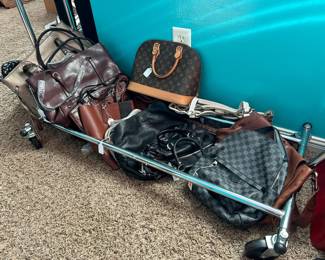 Gorgeous Designer Handbags, Clutch Purses, and More! "Galore!" in excellent condition featuring names like: Louis Vuitton, Coach, Michael Kors, and Many, Many More!!! 