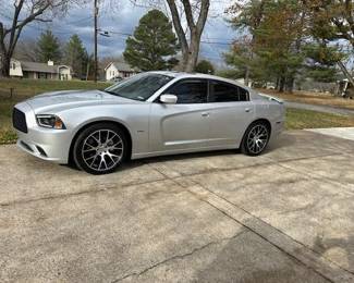 Gorgeous 2012 R/T MAX: Like new both inside and outside * Hemi V8 Motor * Garage Kept ( even the Cup holders on this car are heated and cooled ) Every option that was available is on this car! Owner no longer able to drive it, so it must be sold! Mileage is approx. 145K give or take. Offers on the car will start at  $13,500 . Bids will be taken until 1pm Friday Dec. 15th . At which time the car will be sold to highest bidder for cash or cashiers check.  A must see to appreciate this car!                                                                        VIN # 2C3CDXCTOCH304482.                                       
Many more pics of this car at the bottom of the page.