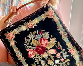 DALE SHOWS THE WONDERFUL NEEDLEPOINT PILLOWCASE.