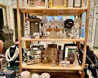 MASTER BATHROOM FULL OF IRICE PERFUME BOTTLES, COSTUME JEWELRY, VINTAGE TRAYS AND MIRROS.