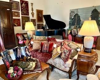 Piano not for sale. Pillows everywhere made of antique and vintage textiles, tassels, and trim sold to high end designers.