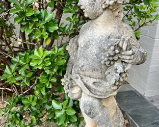 PAIR OF OUTSTANDING CONCRETE STATUES.