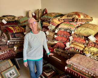 Dawn showing just a part of the large quantity of amazing handcrafted designer pillows!