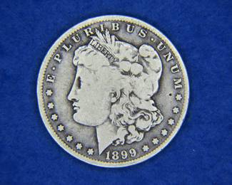 Lot 61. 1899 O Morgan Silver Dollar
