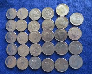 Lot 99. 29 Kennedy Half Dollar Coins from the 70s and 3 from 1980