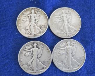 Lot 39. Four Walking Liberty Half Dollars