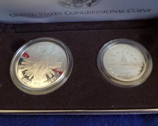 Lot 52. 1989 US Congressional Silver Dollar Containing 26.730 gr. of 90% Silver, and Half Dollar with a COA and display box