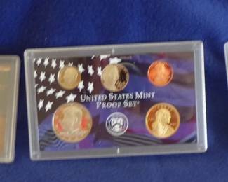 Lot 25. 2007 U.S. Mint Silver Proof Set including:  90% Silver half dollar and dime, five silver state quarters, four gold-plated presidential dollar coins