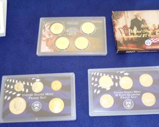 Lot 26. 2007 U.S. Mint Silver Proof Set including:  90% Silver half dollar and dime, five silver state quarters, four gold-plated presidential dollar coins