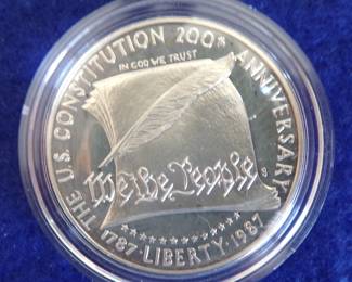 Lot 53. 1987 US Constitution Silver Dollar Containing 26.730 gr. of 90% Silver with a COA and display box