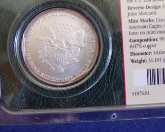 Lot 41. 2004 Silver Eagle in uncirculated condition with one oz. of fine silver