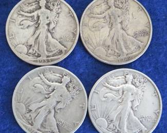 Lot 17. Four Walking Liberty Half Dollars