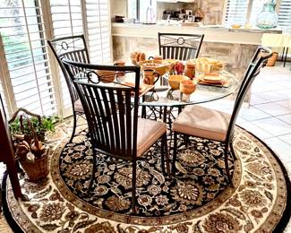 Glass & Metal Round Dinette Table with Four Metal Chairs - Round Rug..