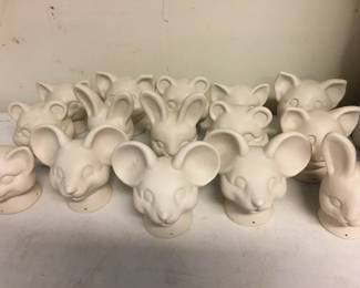 Unfinished ceramic animal heads