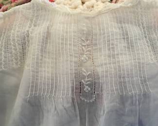 All hand-stitched-embroidered baby dresses