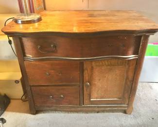 Antique wash stand serpentine drawer
