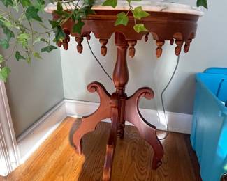 Victorian Marble top side table.  Measures 22"in diameter and 29"h