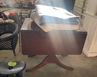 Duncan Phyfe syle table - great for small spaces but folds out for a dinner party or holiday in a snap! 