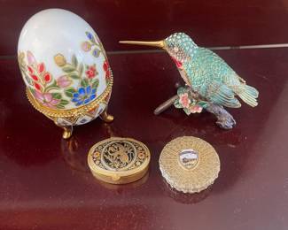 Several cloisonné, Limoges, souvenir pill boxes to choose from. 