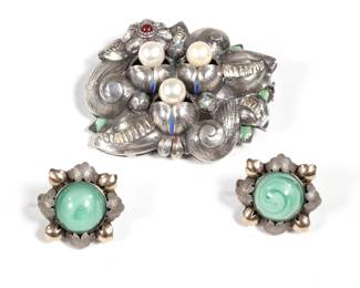 (3pc) JENSEN-STYLE STERLING JEWELRY | Including a signed pin with old enamel, a single red cabochon, and three pearls or faux pearls (2 in.), marked indistinctly on back border, possible a "B" or "8" within reserve; plus a pair of earrings with green plastic cabochons set in (tested to) sterling and (untested) gold; all together 1.11 ozt
