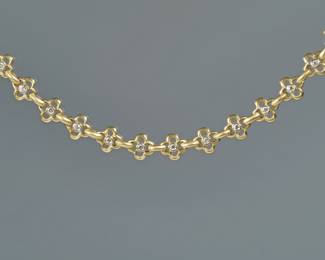 SEIDENGANG DIAMOND & 18K GOLD OPEN LINK NECKLACE | Designed as a line of open clover-form links, twelve central links mounting melee diamonds; marked "18k / SG". 16 in., 44.1g

