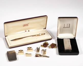 DUNHILL, CROSS, & OTHER | Including a Dunhill lighter in original box, a Cross 14k gold-filled pen in original box, a pair of Swank bullet-form cufflinks and matching shotgun-form clip, a sterling clip multi-tool, a pair of Shields gold-tone cufflinks and matching clip, and a pair of wood and brass cuff links.

