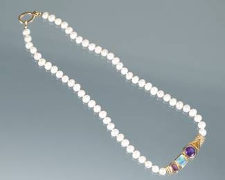 GEMSTONE, PEARL, & 18K GOLD NECKLACE | Designed as a central line of conjoined bezel mounted mixed cut gemstones (garnet, aquamarine, amethyst, citrine) suspended from a knotted pearl necklace (6.4mm oblong pearls); clasp marked "18K"
16 in., 22.5g
