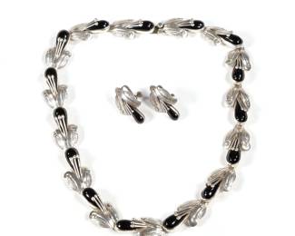 (3pc) MEXICAN STERLING SUITE | Teardrop-shaped onyx set in sterling silver links, signed "TH-107 / MEXICO / 925" on the clasp of the necklace, with a pair of matching screw-back earrings, signed illegibly; 3.25 ozt, l. 19.5 in.
