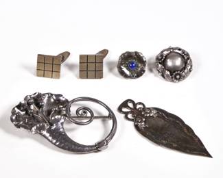 (6pc) GEORG JENSEN & OTHER JEWELRY | Georg Jensen sterling silver jewelry, including a flower-shaped pin with scroll, no. 135 (2 in.), a single earring with lapis cabochon, and a Jensen bookmark, with two Georg Jensen jewelry boxes; plus a pair of N. E. From gold-washed sterling silver cufflinks and a Danish N. E. From flower pin (dia. 1 in.); all together 1.59 ozt
