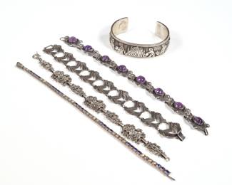 (5pc) STERLING BRACELETS | Including a Taxco amethyst cabochon bracelet (l. 7.25 in.), an LL. BCT sterling cuff bracelet with figures, a Mexican sterling link bracelet, a flower link marcasite bracelet, and a sterling bracelet with white and blue stones; all together 3.09 ozt
