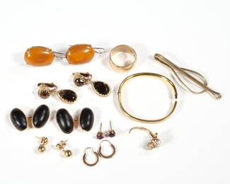MISC. 14K GOLD JEWELRY | Antique and other 14k gold jewelry (each marked or tested to), including; a baby's hard bracelet; a pair of clip earrings with faceted brown stones, a pair of amber or carnelian earrings, a ring fragment with two pearls, a clip or bookmark, a BRULL wedding band, a pair of jet cufflinks, and three pairs of small earrings; all together 45.5g
