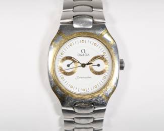 OMEGA POLARIS SEAMASTER WRISTWATCH | C. 1980s, white dial with gold subdials, dot numerals, steel case and band with 18k gold highlights; case diameter 32mm.  - l. 7 in. (band approx.)
