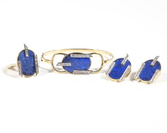 (4pc) LAPIS LAZULI, DIAMOND & GOLD PARURE | Comprising a bracelet, ring, and pair of earrings; having oval plaques of lapis lazuli embellished with lines of gold mounting melee diamonds; tested to 18k gold - no apparent makers mark or fineness marking
38.9g

