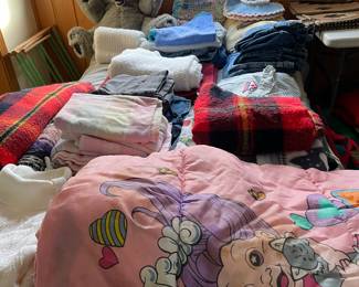 Large selection of linens, bedding, etc. throughout.