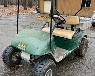 E-Z-GO golf cart — runs great (needs a bath).