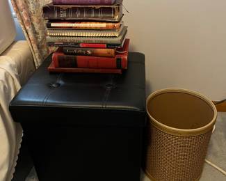 Ottoman/chest; selection of Bibles and religious books.