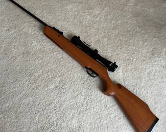 Crosman Quest 1000x pellet rifle with Crosman 4x32 scope.
