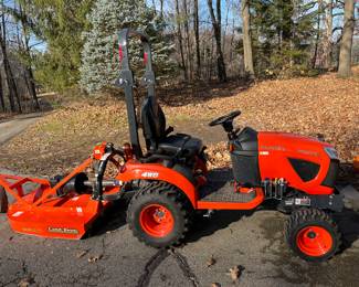 Kubota Tractor BX2380, purchased new in September, 2022, and with only 16.5 hours on it! Includes brush hog.