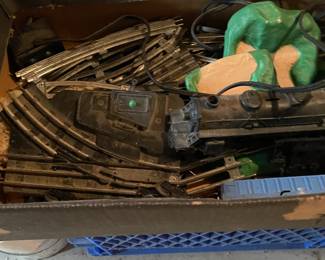 Vintage model railroad engine and tracks.