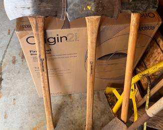 Pair of Collins axes; sledgehammer (right) with American hickory handle.