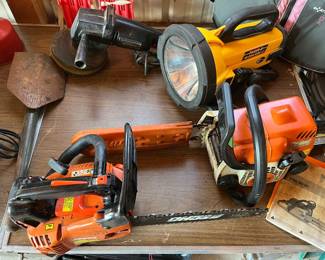 THOR-X Cyclops heavy-duty flashlight/lamp (rear right corner in photo); Stihl MS 180C chainsaw (right-center); Echo 12” chainsaw (front).