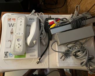 Wii Fit with controllers/accessories.