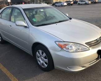 2003 Toyota Camry LE, low miles: 86,000. $5300