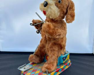 Vintage Toy Dog Playing Drums