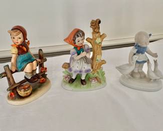 $40 - left and center with tree trunk: 5" H, 4" W, 2.5" D - $50 for Lladro on right. Far right not for sale.